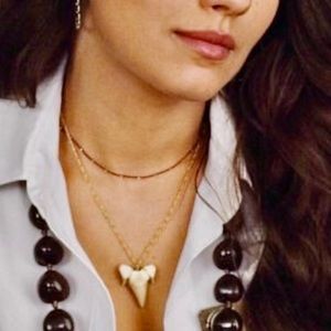 Shark tooth necklace Mila Kunis wore in movie